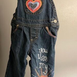 Oshkosh  Denim Overalls with Heart Design and sun. Size 12m.